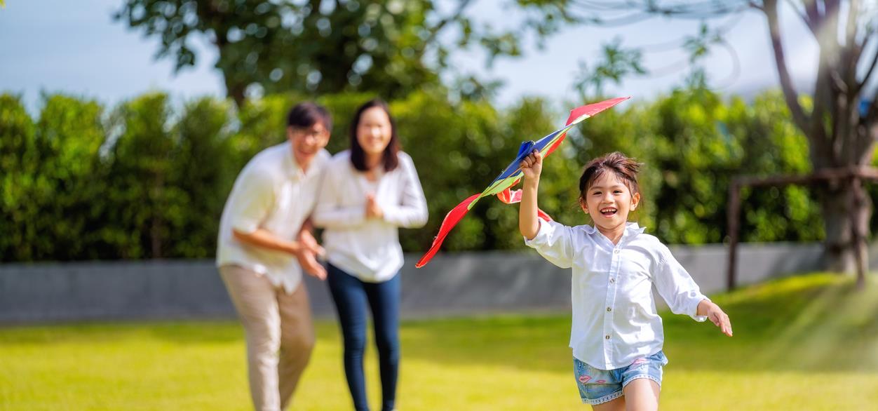 Girl flying a kite